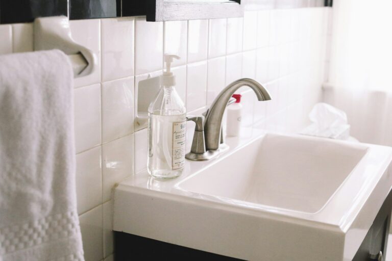 best automatic soap dispensers in Canada beside a bathroom sink