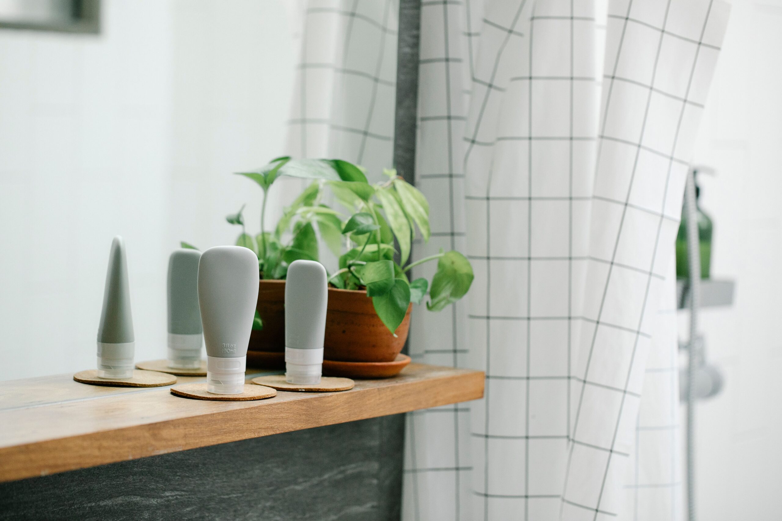 bathroom shelf and shower curtain context for renter-friendly shower storage