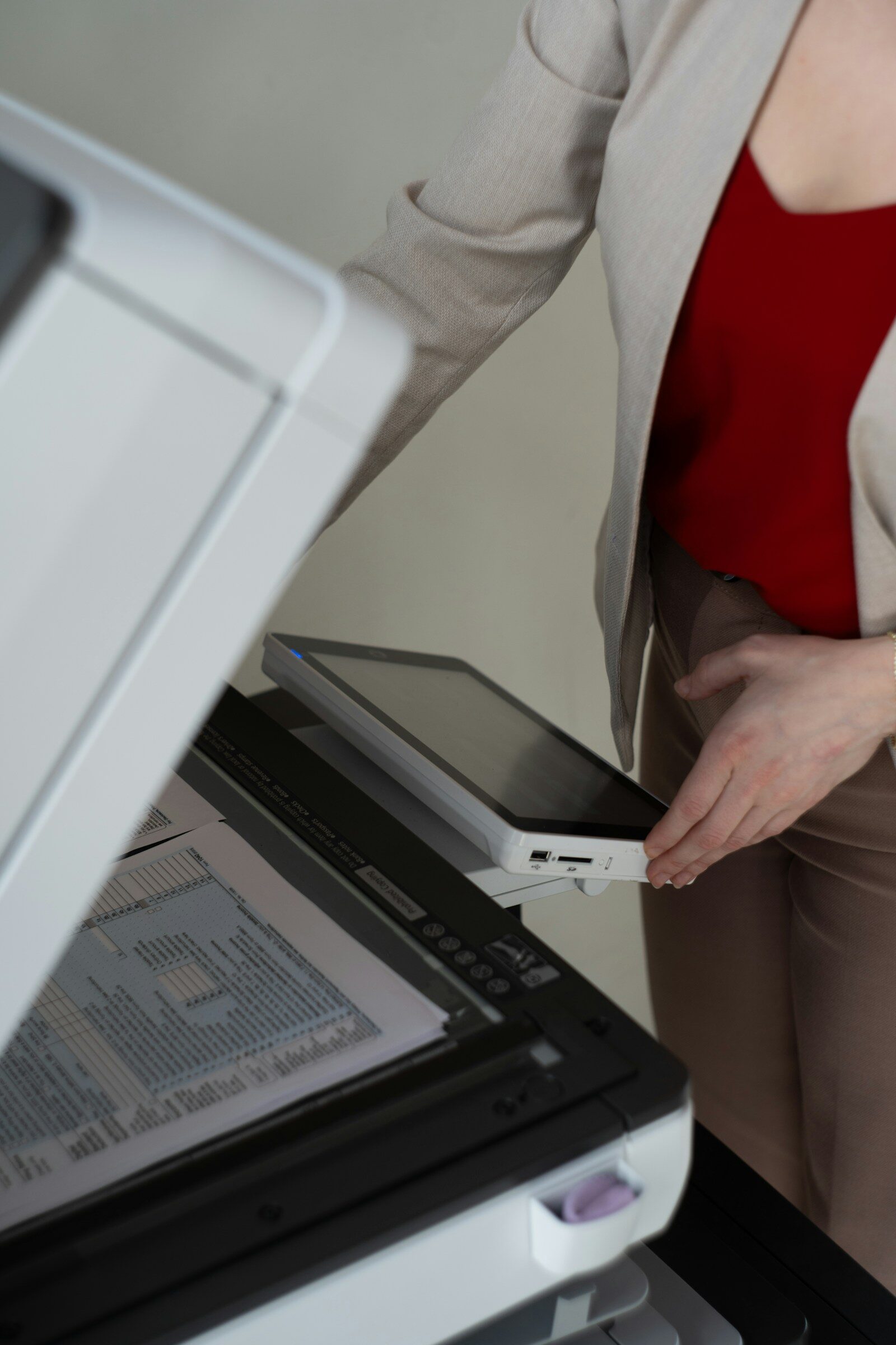 Home office document scanners in Canada setup context with paperwork and scanner feeder
