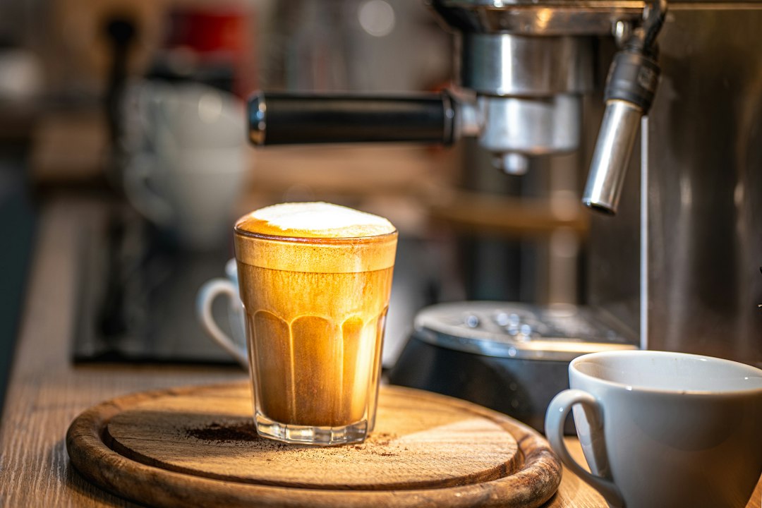 Coffee with frothed milk illustrating texture and serving-size differences between milk frothers